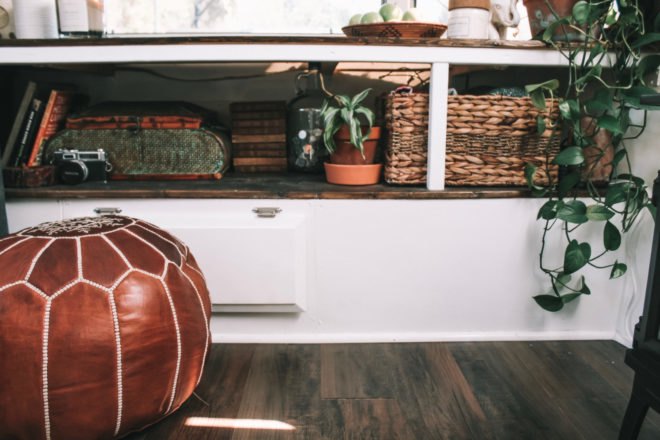 shelves with baskets and books