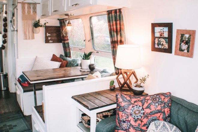 wood dining booth and large windows