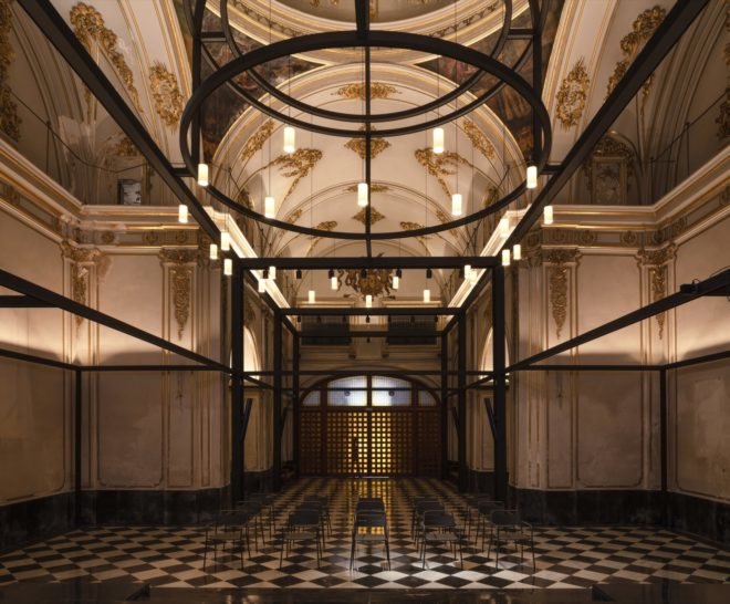 large church space with gold detailed ceilings and walls