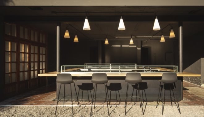 bar counter with black chairs