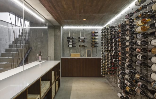 wine cellar with wall of wine bottles