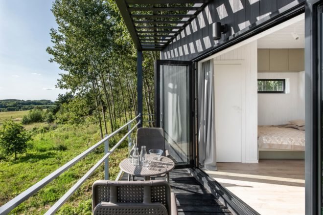 outdoor deck area with dining table
