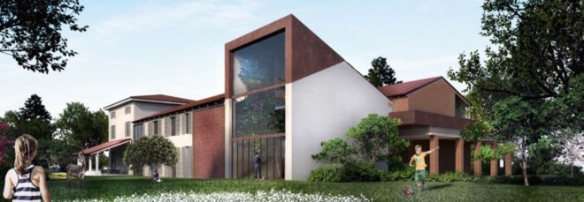 cropped close-up of rendering of white and brick building with sloping roof