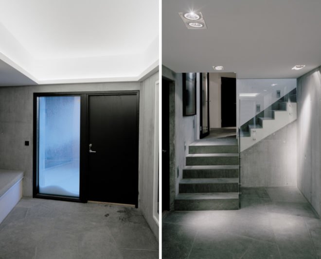 An interior space with stairs leading to a second level