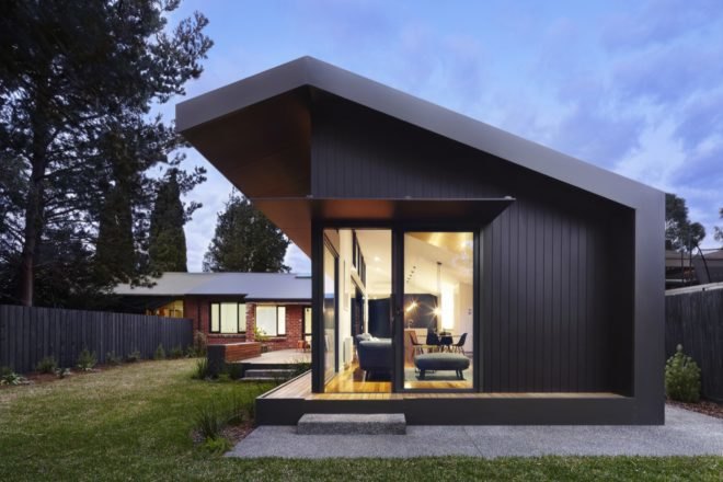 black extension to a brick home
