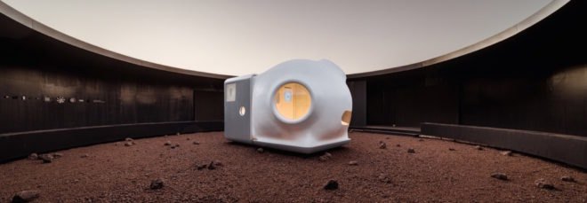cropped close-up of rendering of white pod-like home on Mars