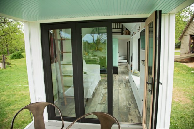glass doorway with one panel opened