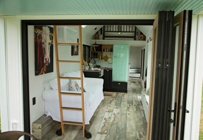 wood ladder beside white couch