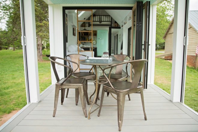 bronze chairs and table on small porch