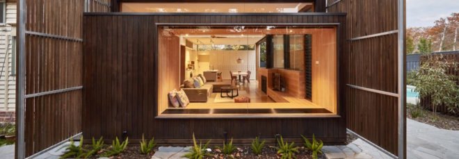 home surrounded by large timber screens