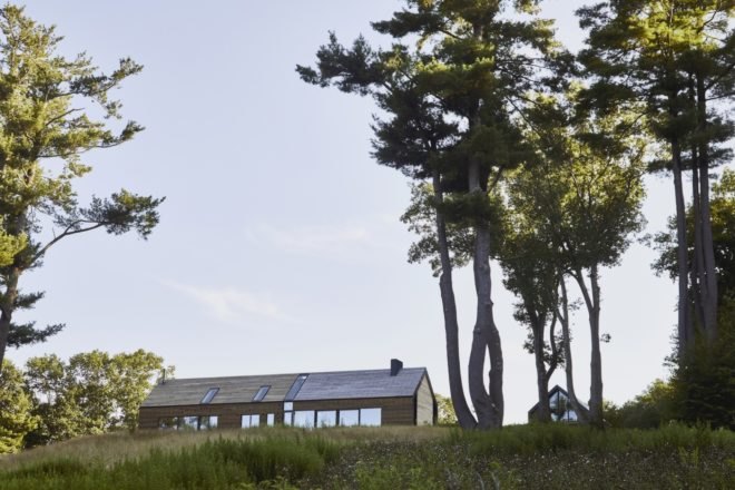 long timber home with gabled roof