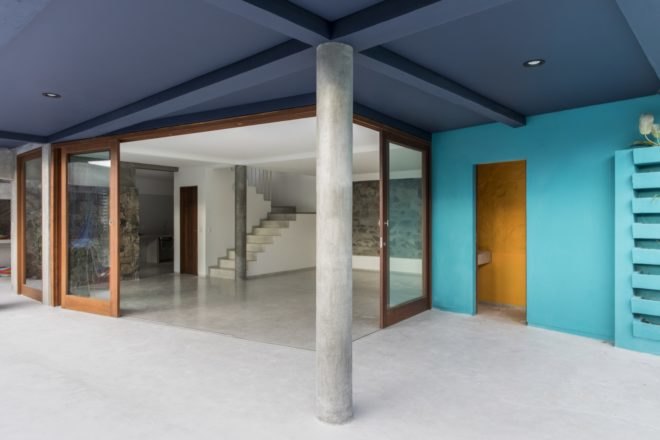 home with bright blue and white walls