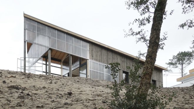 gabled timber home with transparent front porch