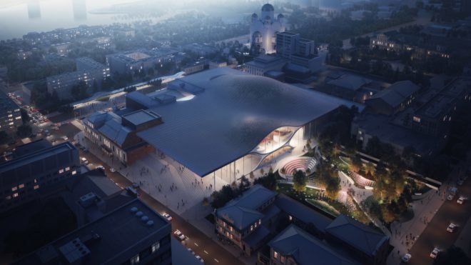 aerial view rendering of concert hall with curving roof in a big city