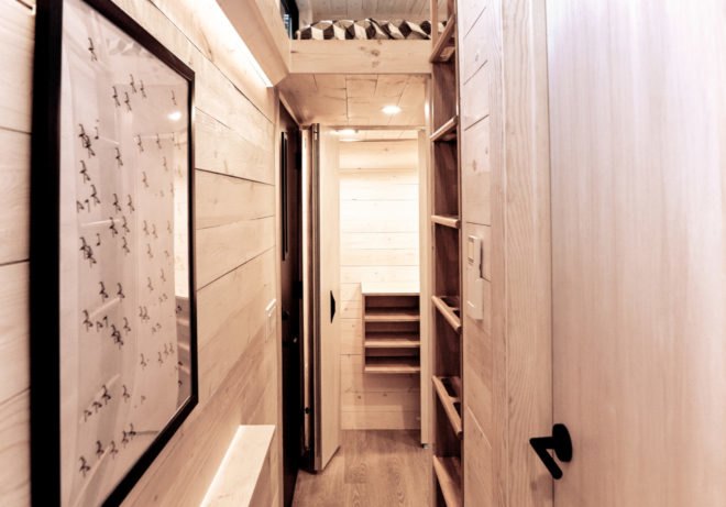 wooden hallway with shelving