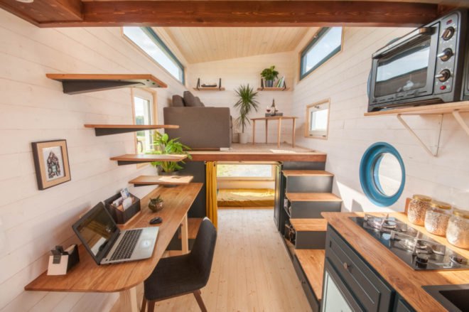living space with elevated living room in the distance