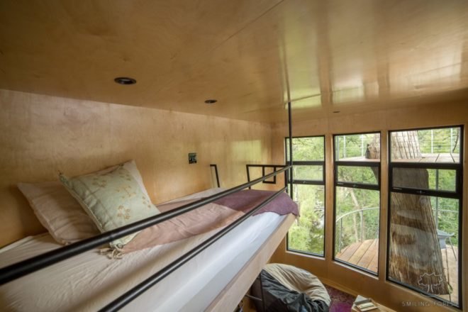 small bunk bed with railings