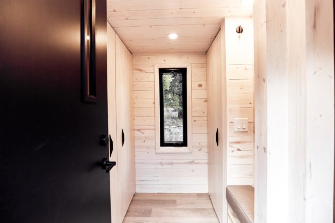 wood-clad interior with vertical window
