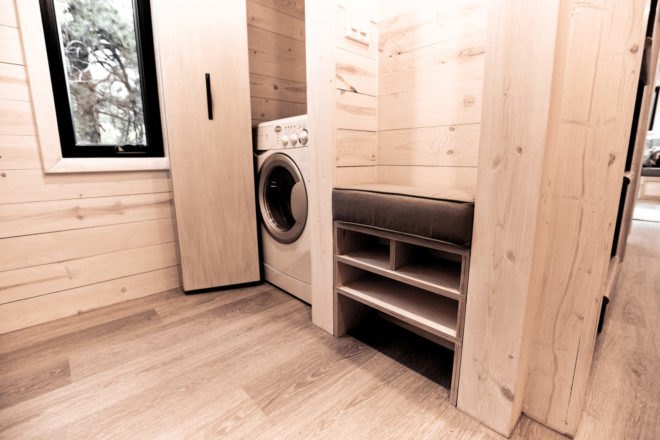 wood-clad interior with washing machine