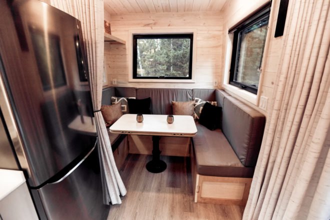 wood-lined dining area with booth seating