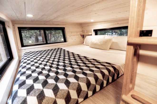 bedroom with black and white blanket