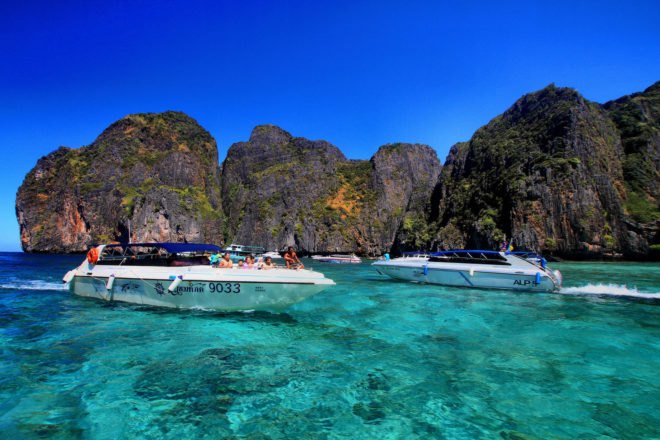 several tourist boats in Maya Bay