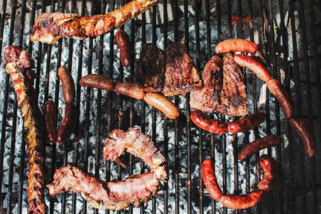 variety of meat on a grill