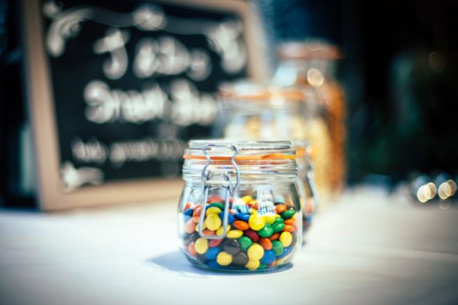 glass jars with clamp lids filled with candy