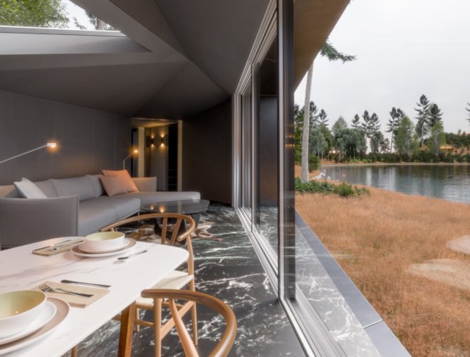 living and dining space with all-glass wall