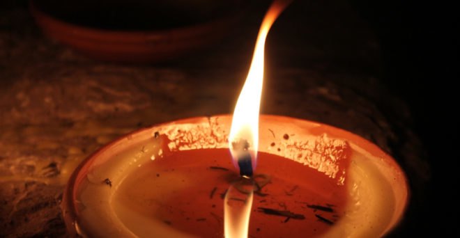 Burning candle wick