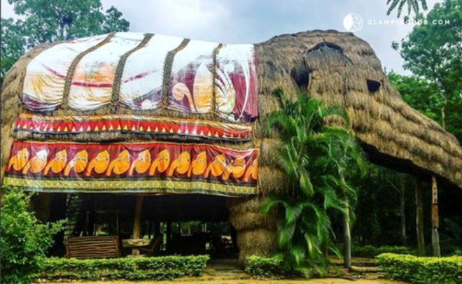 elephant-shaped hotel made from straw and wood