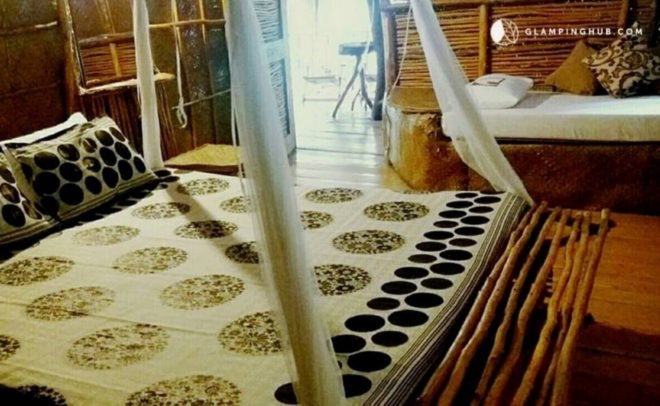 bed with mosquito netting