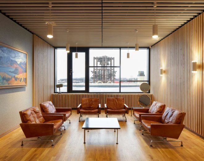 private meeting area with orange chairs