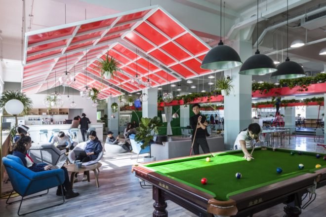 white and red office with a pool table