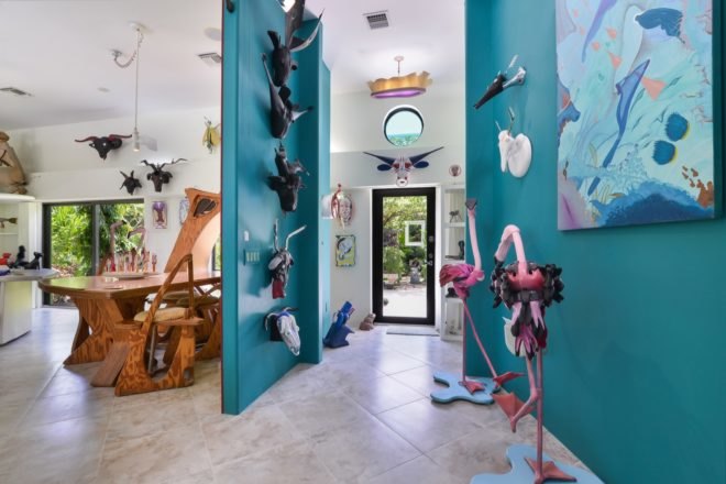 upcycled art on blue walls