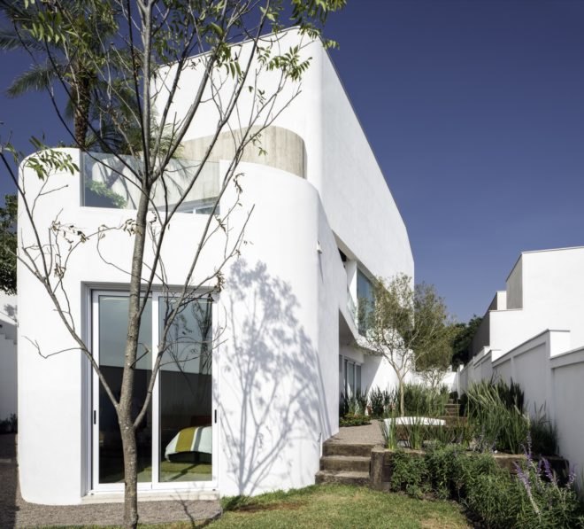 large white home with slightly curved walls