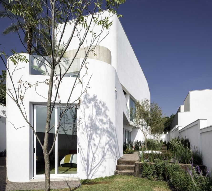 large white home with slightly curved walls