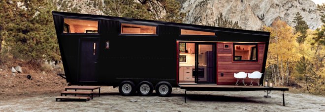 black RV with windows and front deck