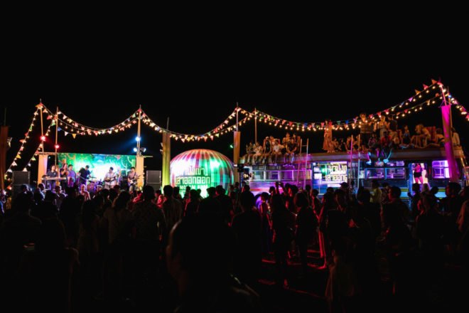 colorful stages lit up at night