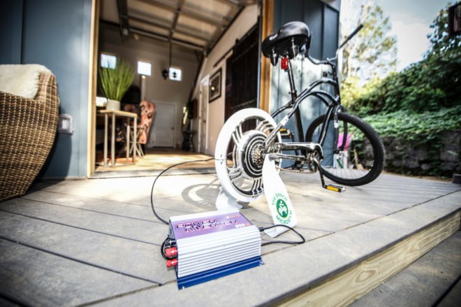 a bike charging on outdoor deck