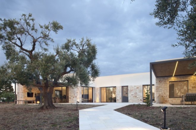 modern home with trees around it