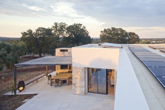 home with solar panels on roof