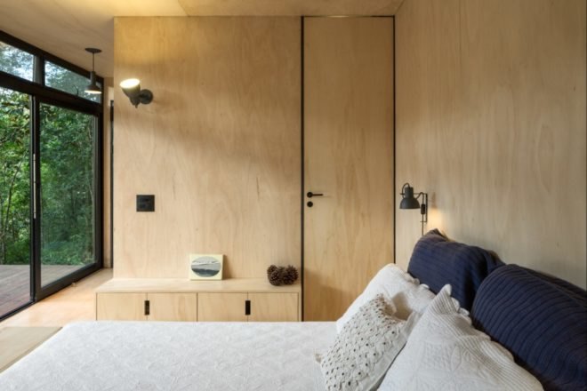 bed with white comforter and pillows