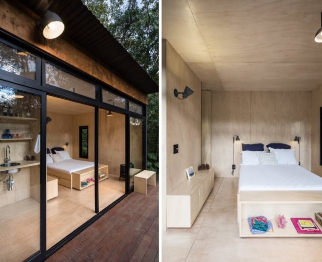 On the left, glazed doors open to deck. On the right, plywood-lined interior with white bed.
