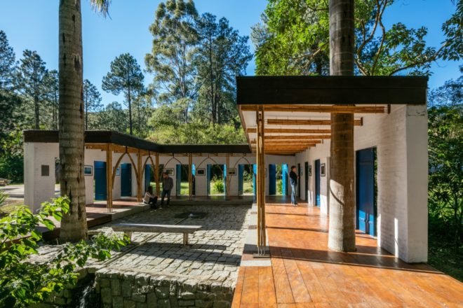 wooden walkway through outdoor gallery