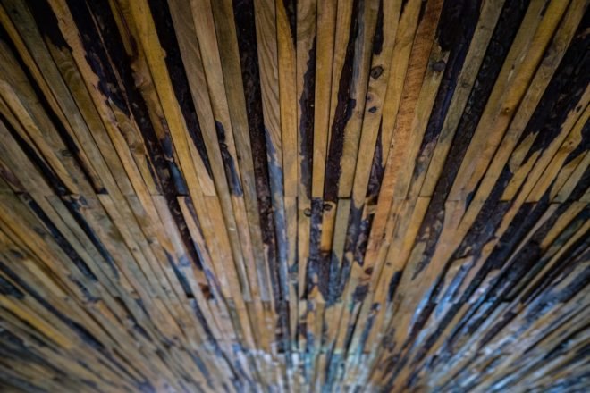 close look at the recycled wood used for the ceiling modules