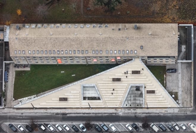 aerial view of building with walkable roof