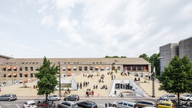 people sitting on roof of building