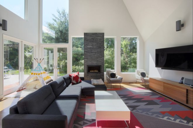 interior living space with gray sofas and large windows