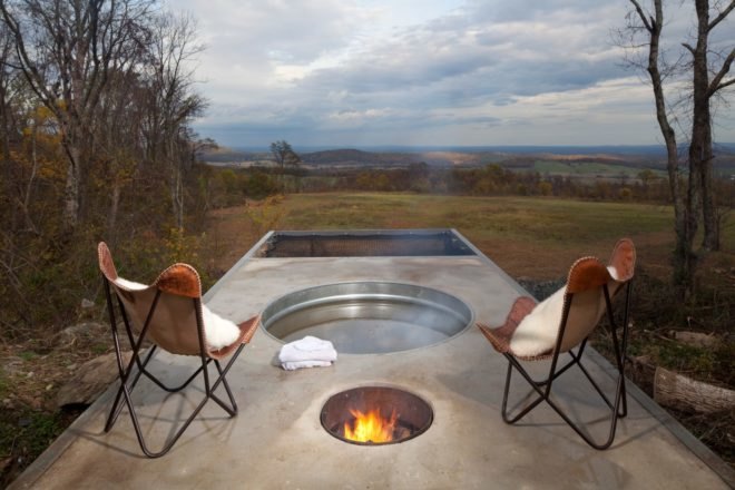 two chairs and a metal hot tub